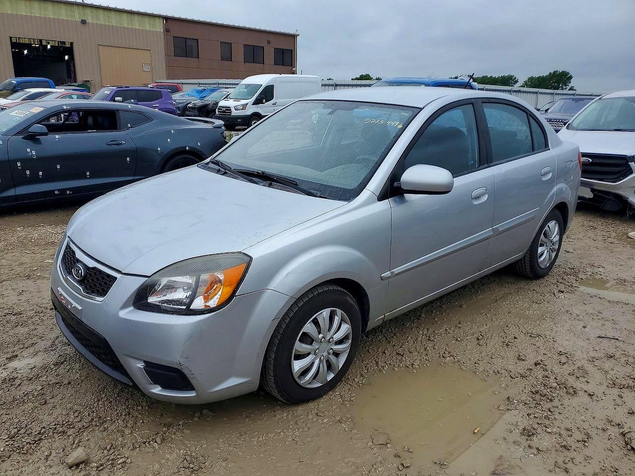 2010 Kia Rio Base Silver vin: KNADH4A33A6680109