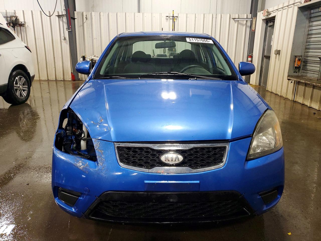 2010 Kia Rio Base Blue vin: KNADH4A37A6610628