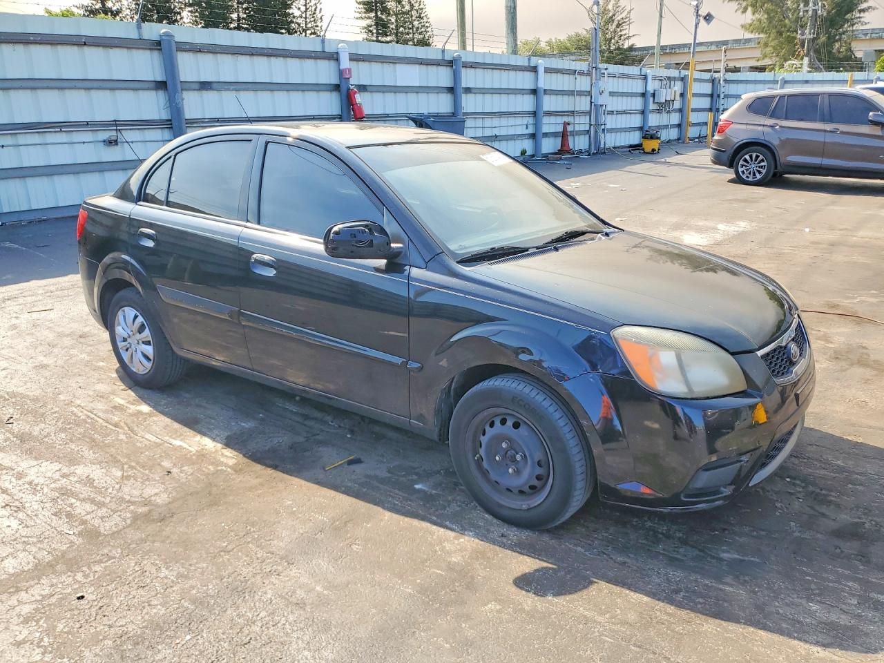 2010 Kia Rio Base Black vin: KNADH4A38A6635781