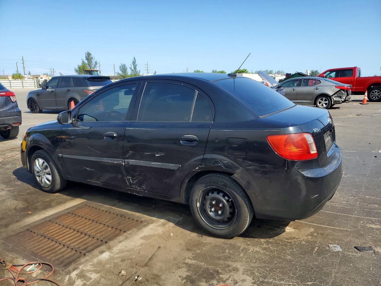 2010 Kia Rio Base Black vin: KNADH4A38A6635781