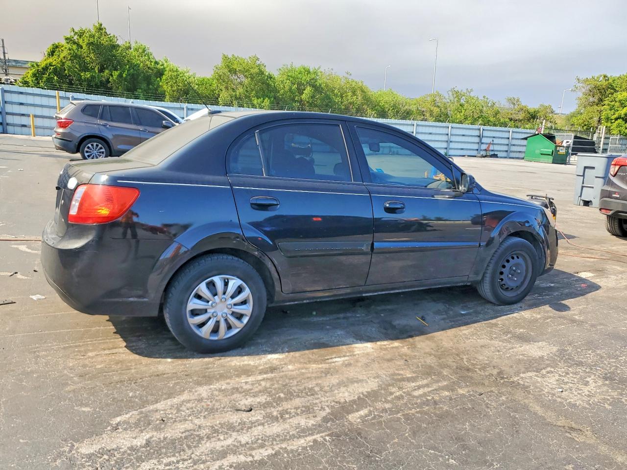2010 Kia Rio Base Black vin: KNADH4A38A6635781