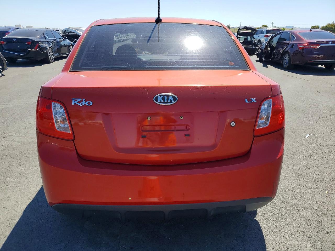 2011 Kia Rio Lx Оранжевый vin: KNADH4A38B6850272