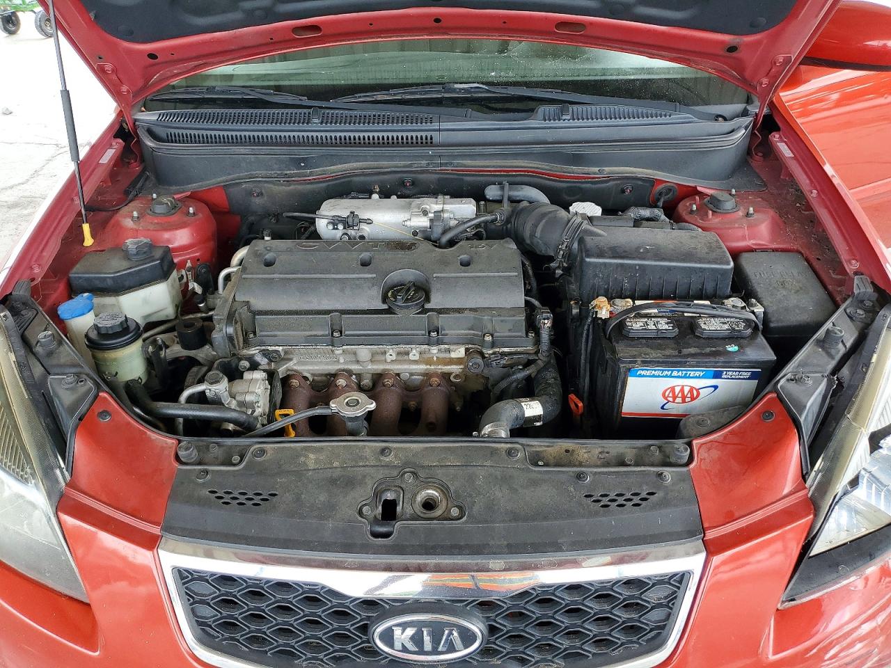 2010 Kia Rio Base Red vin: KNADH4A39A6640309