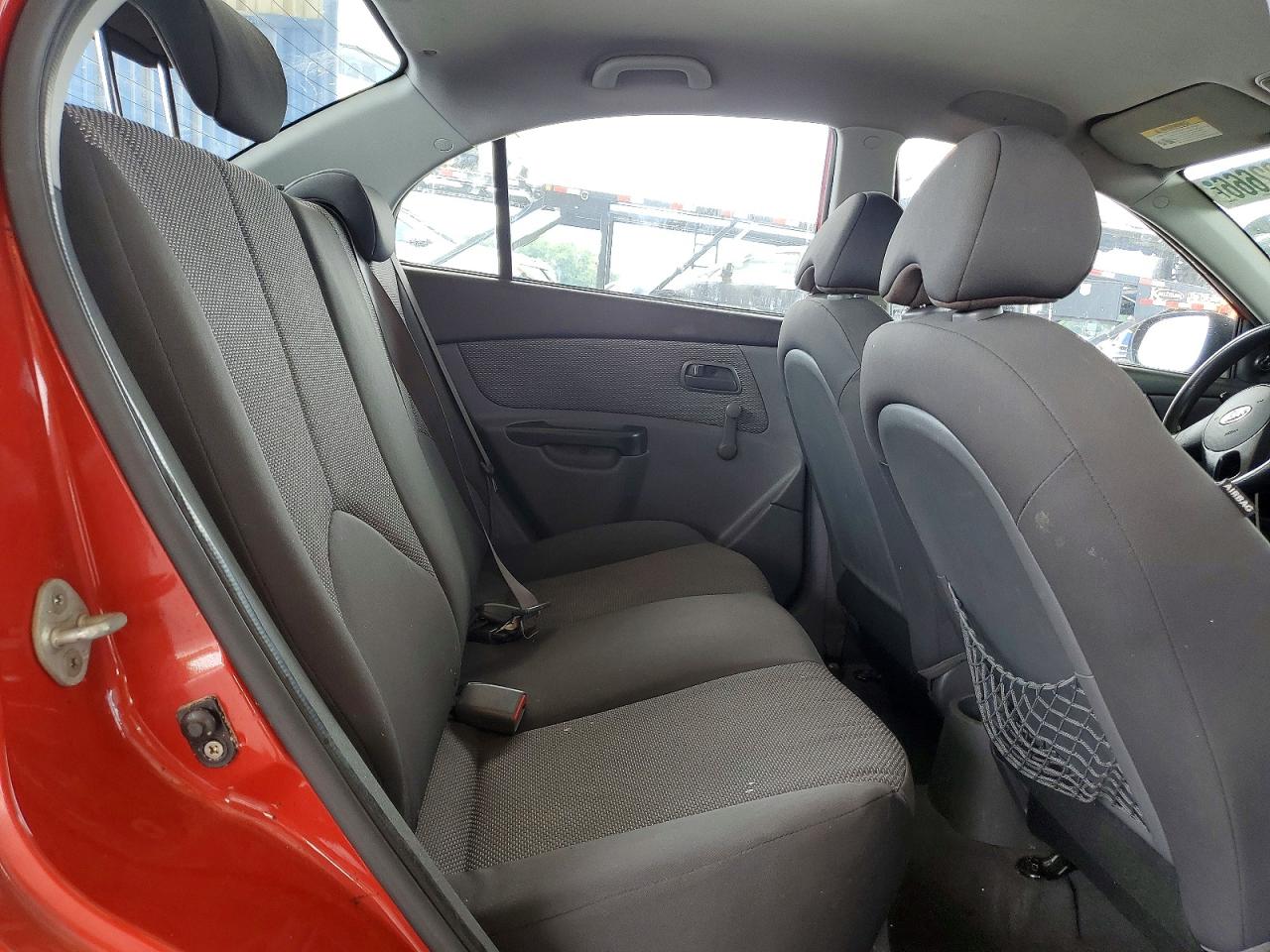 2010 Kia Rio Base Red vin: KNADH4A39A6640309