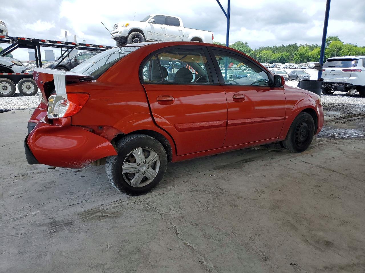 2010 Kia Rio Base Red vin: KNADH4A39A6640309