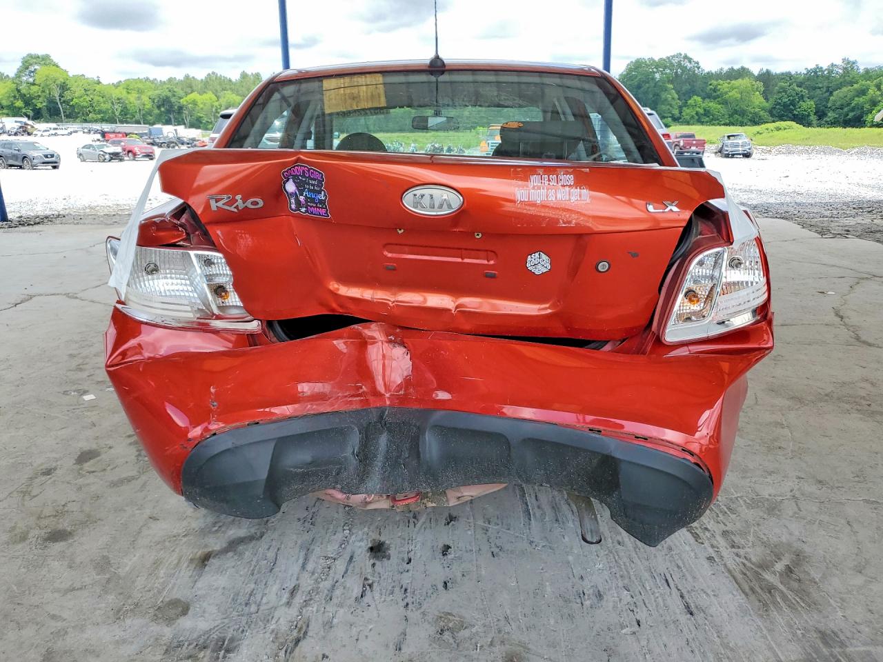 2010 Kia Rio Base Red vin: KNADH4A39A6640309