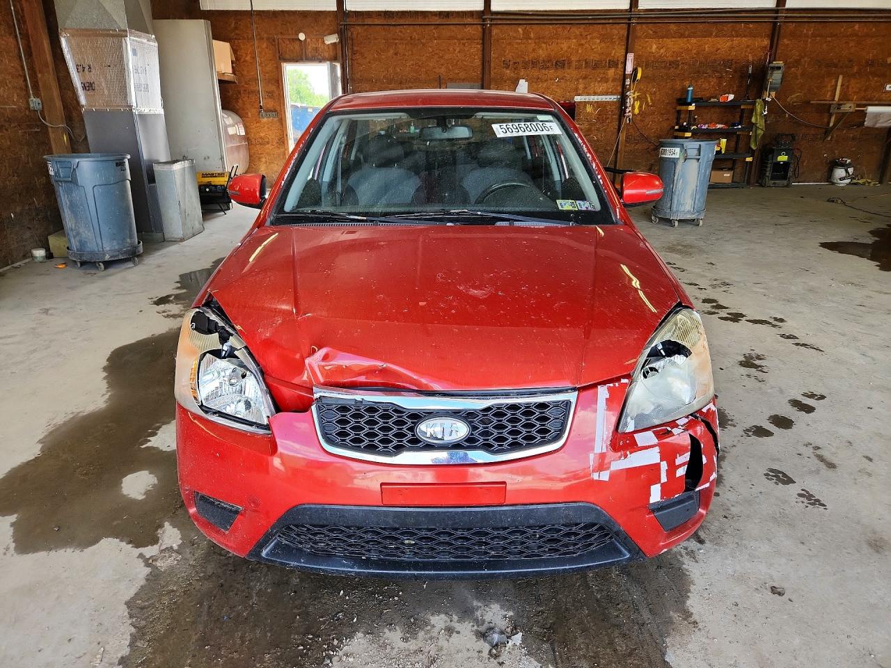 2010 Kia Rio Base Red vin: KNADH4A39A6665405