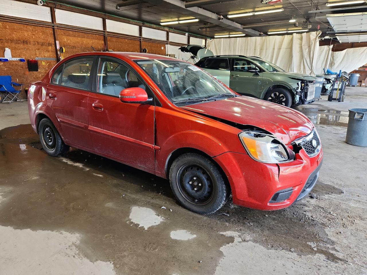 2010 Kia Rio Base Red vin: KNADH4A39A6665405