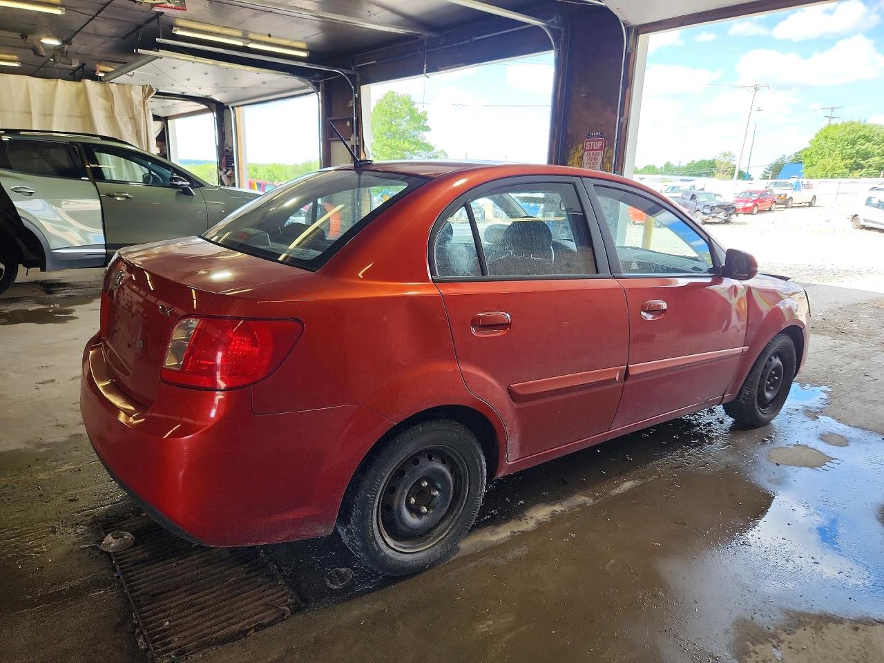 2010 Kia Rio Base Red vin: KNADH4A39A6665405