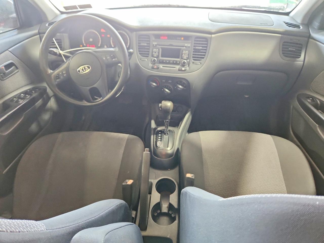2010 Kia Rio Base Red vin: KNADH4A39A6665405