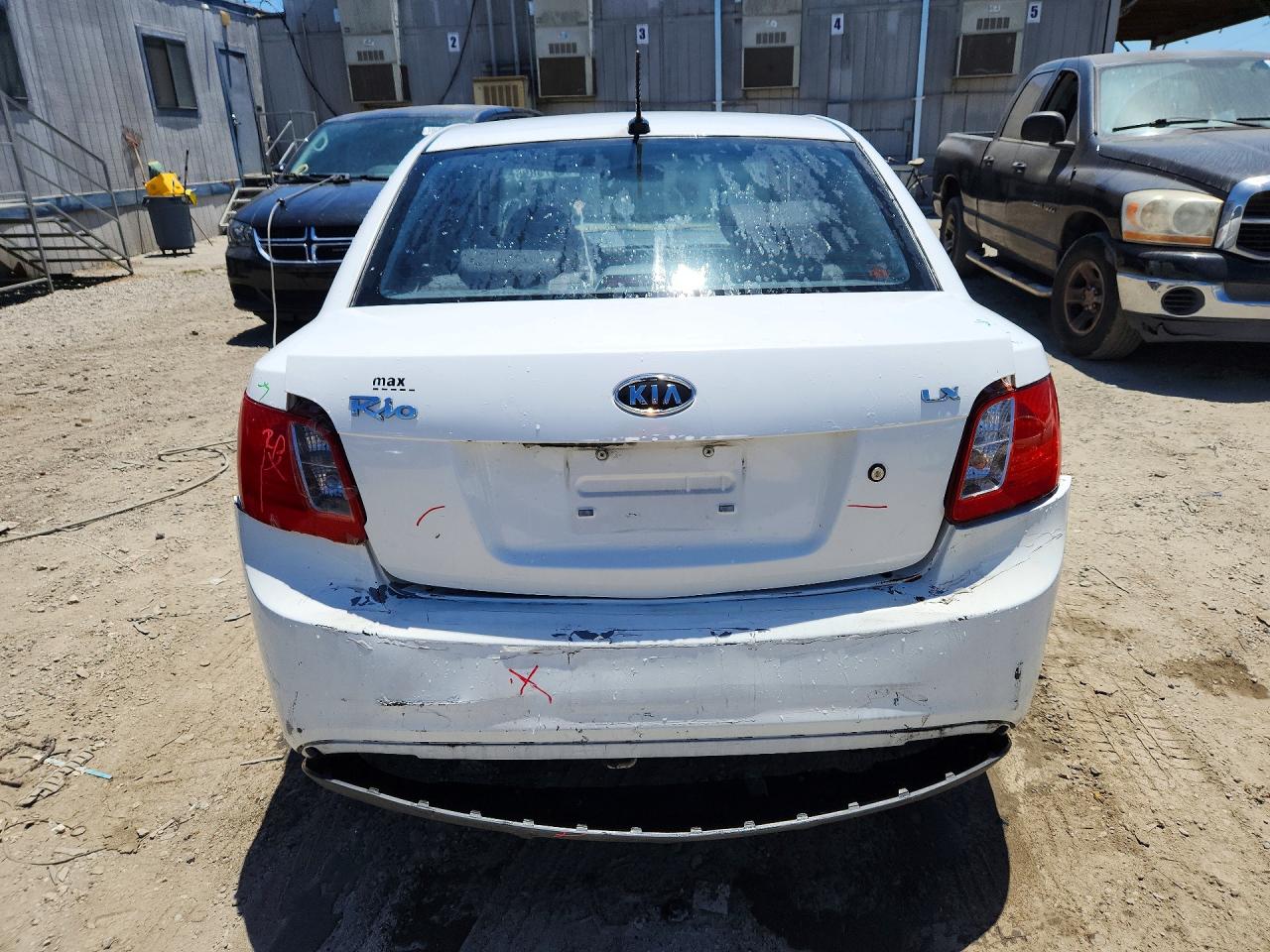 2010 Kia Rio Base White vin: KNADH4A39A6692121