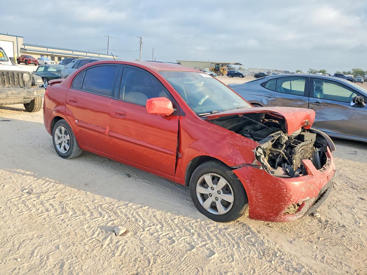2010 Kia Rio Base Red vin: KNADH4A3XA6661203
