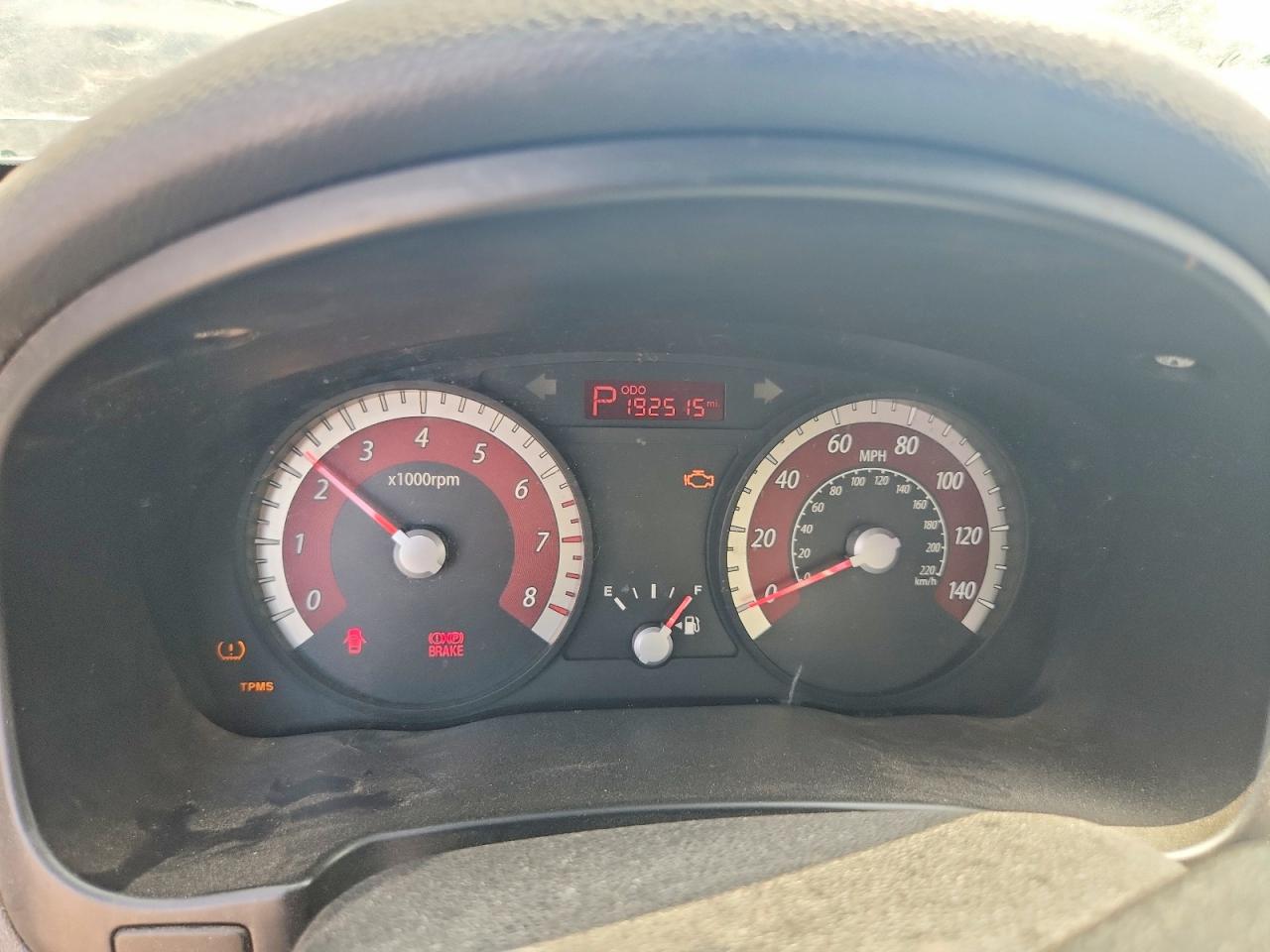 2010 Kia Rio Base Red vin: KNADH4A3XA6661203