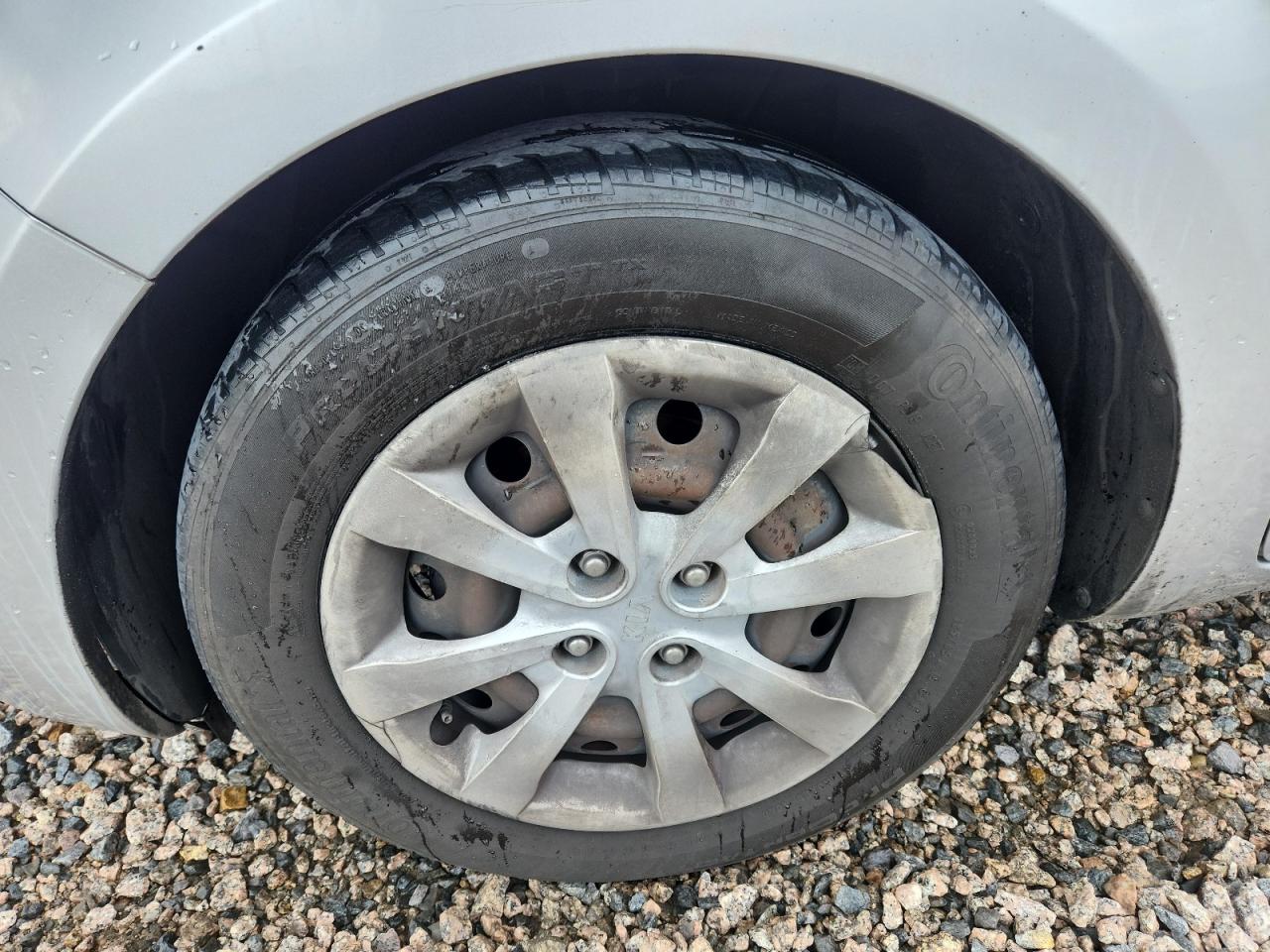 2013 Kia Rio Lx Silver vin: KNADM4A36D6194894 Damage: Left Front Wheel Cover, Broken, Replacement Required