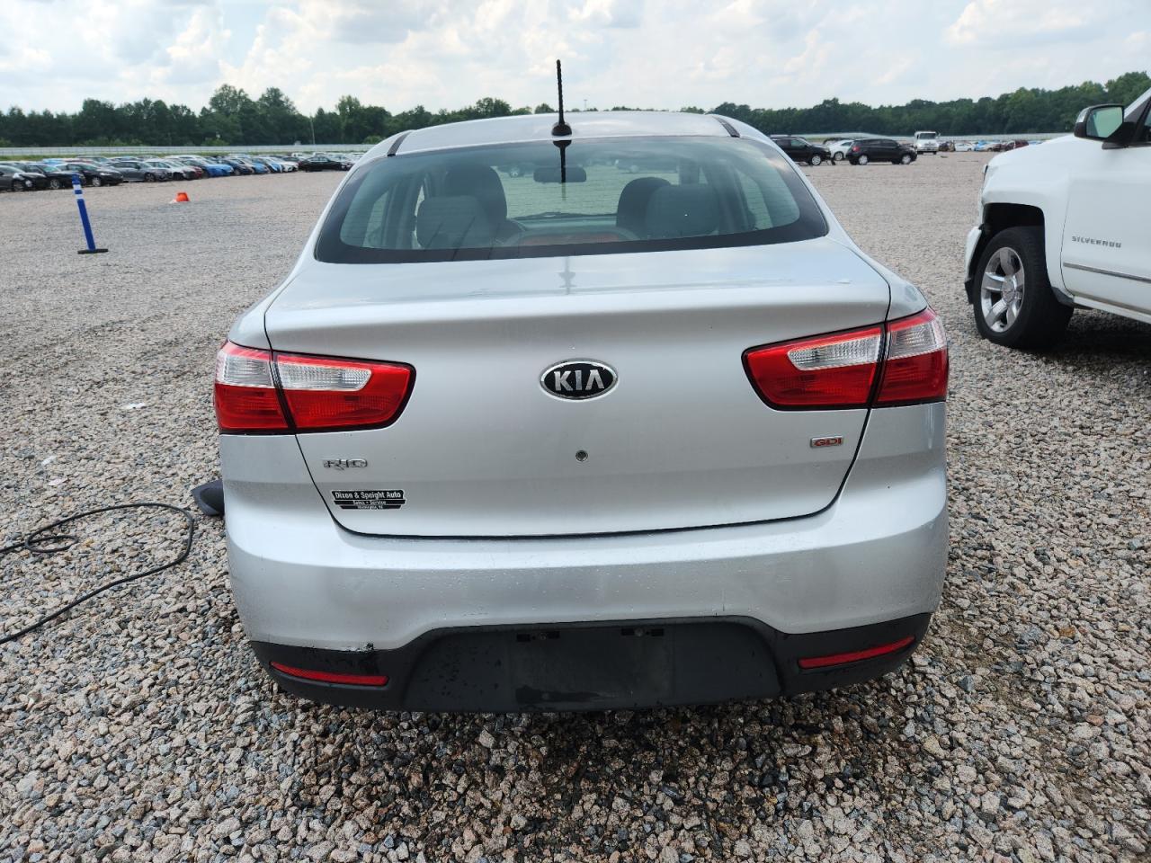 2013 Kia Rio Lx Silver vin: KNADM4A36D6194894 Damage: Deck Lid, Dent(S) W/ Paint Dmg, 1/2 To 1 Inch