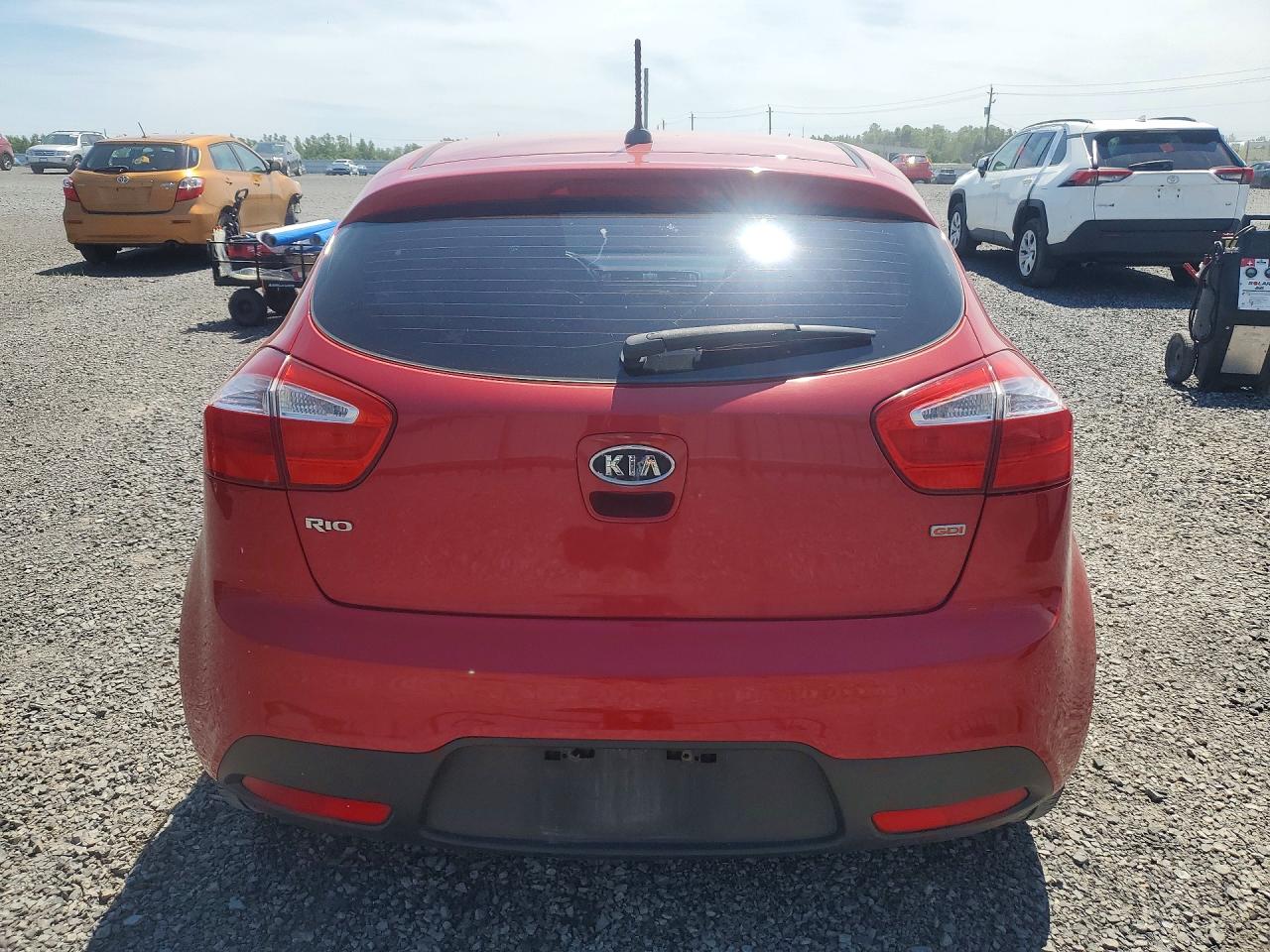 2012 Kia Rio Lx Red vin: KNADM5A35C6735521