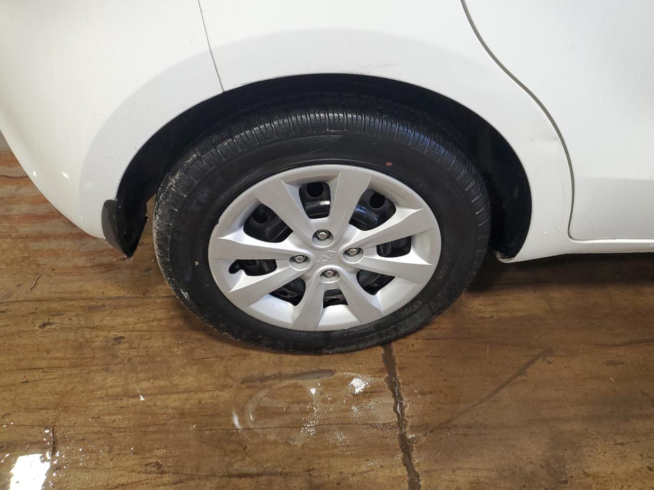 2013 Kia Rio Lx White vin: KNADM5A3XD6301080 Damage: Right Rear Wheel Cover, Curb Rash, 1/2 To 1 Inch
