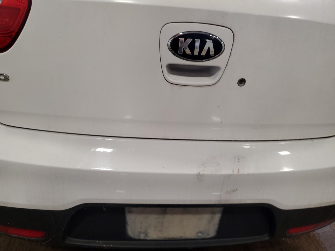 2013 Kia Rio Lx White vin: KNADM5A3XD6301080 Damage: Lift Gate, Chipped, 2
