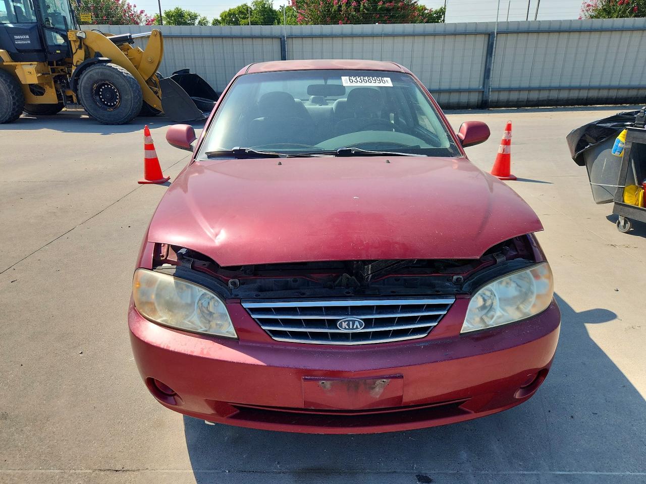 2004 Kia Spectra Base Burgundy vin: KNAFB121045303396