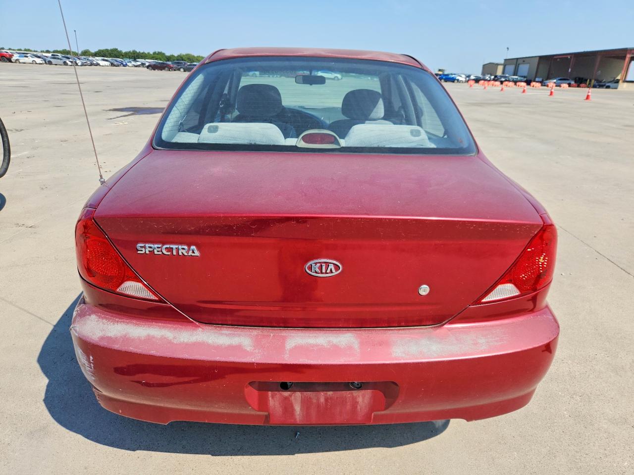2004 Kia Spectra Base Burgundy vin: KNAFB121045303396