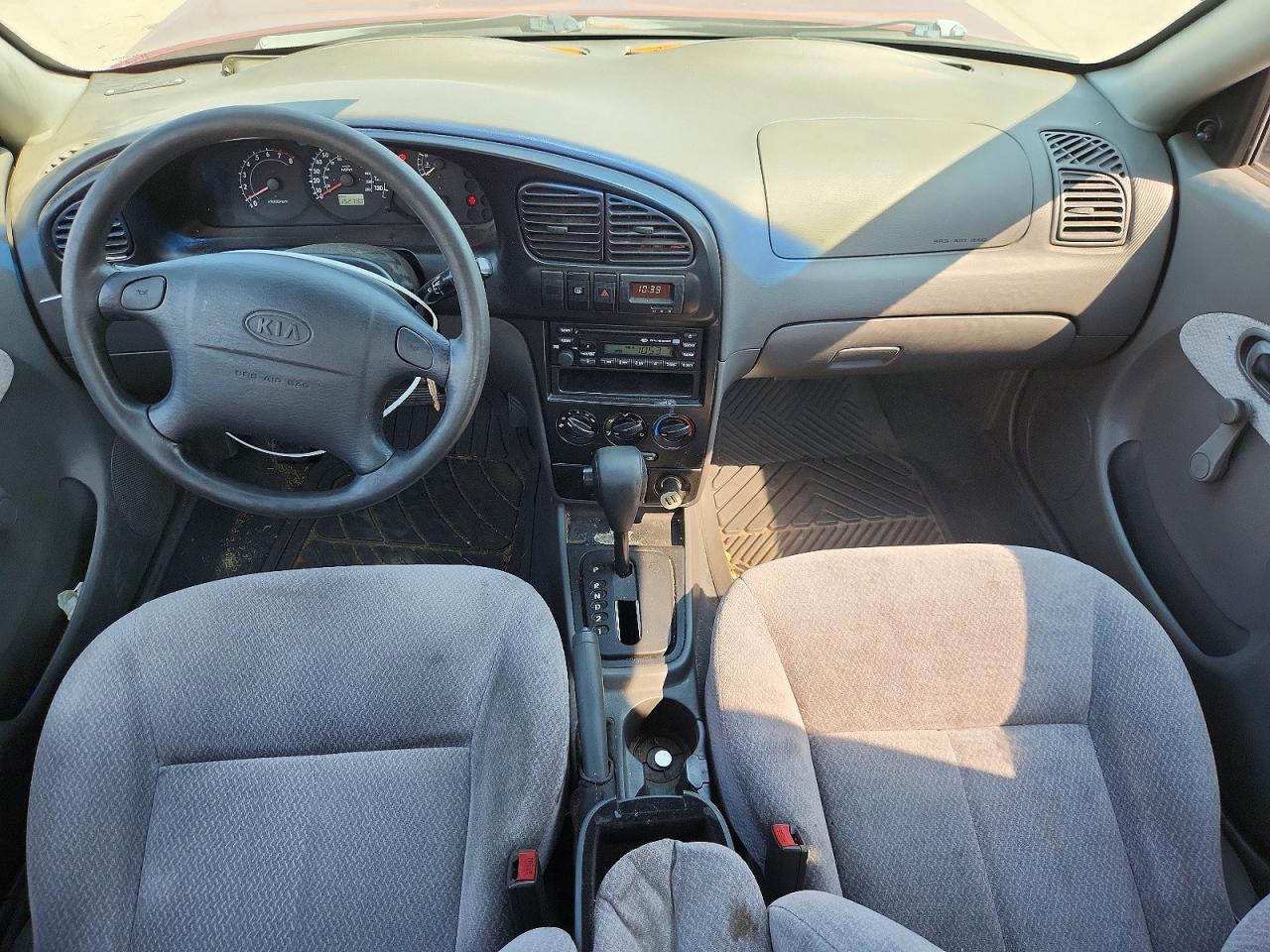 2004 Kia Spectra Base Burgundy vin: KNAFB121045303396