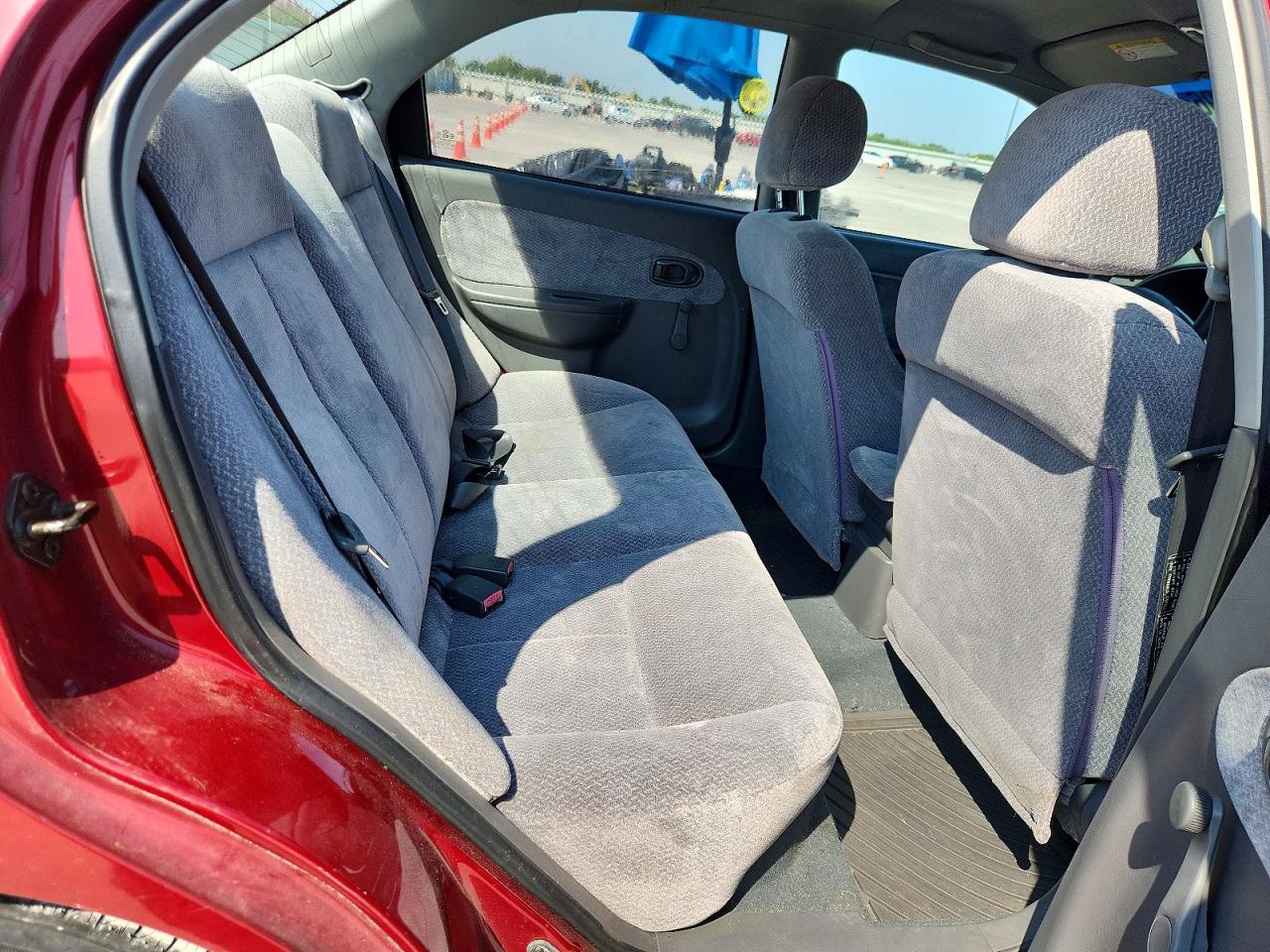 2004 Kia Spectra Base Burgundy vin: KNAFB121045303396