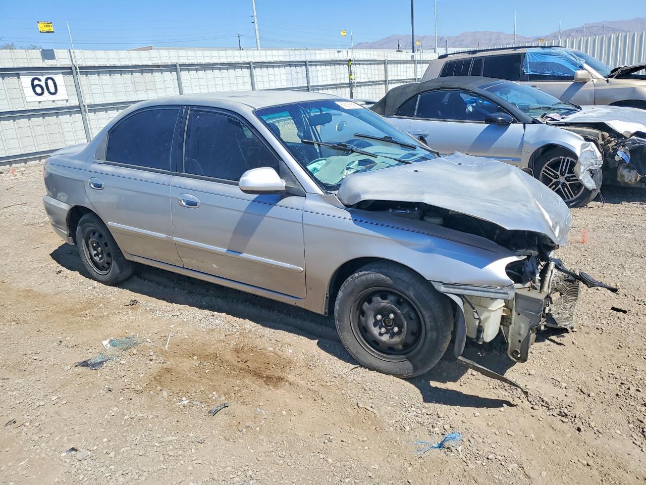 2004 Kia Spectra Base Silver vin: KNAFB121045314799