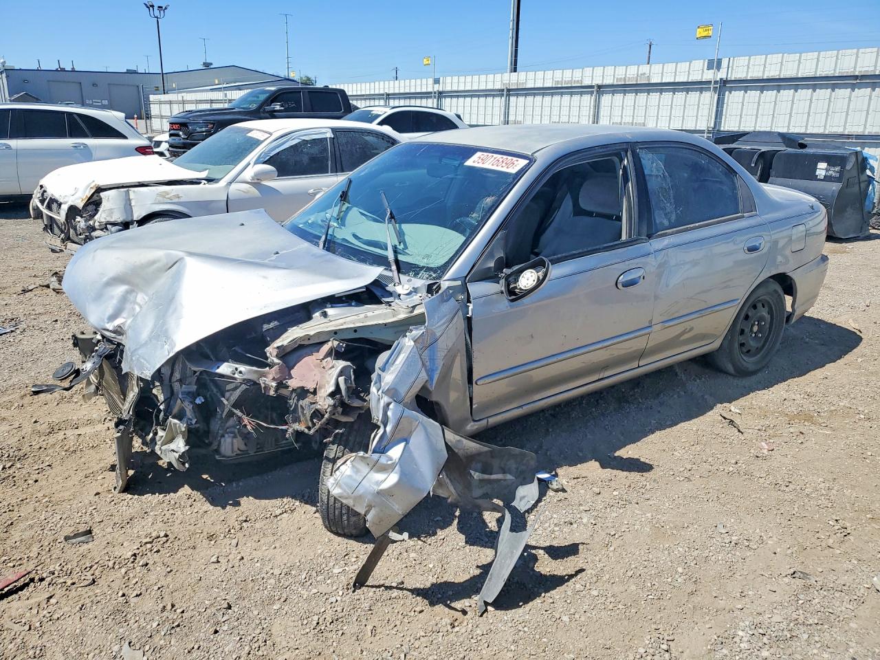 2004 Kia Spectra Base Silver vin: KNAFB121045314799