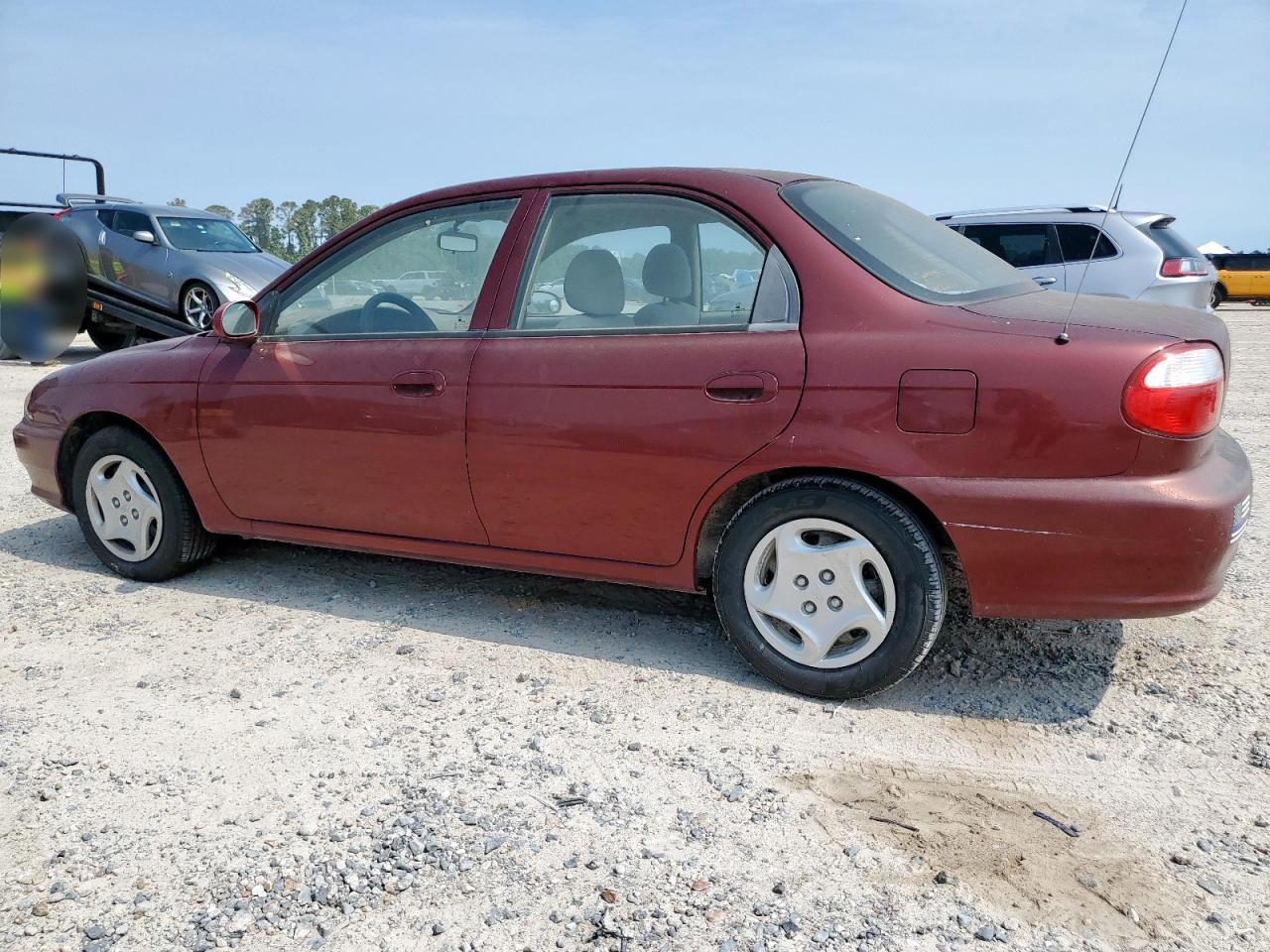 2001 Kia Sephia Base   Темно-бордовый vin: KNAFB121315054488