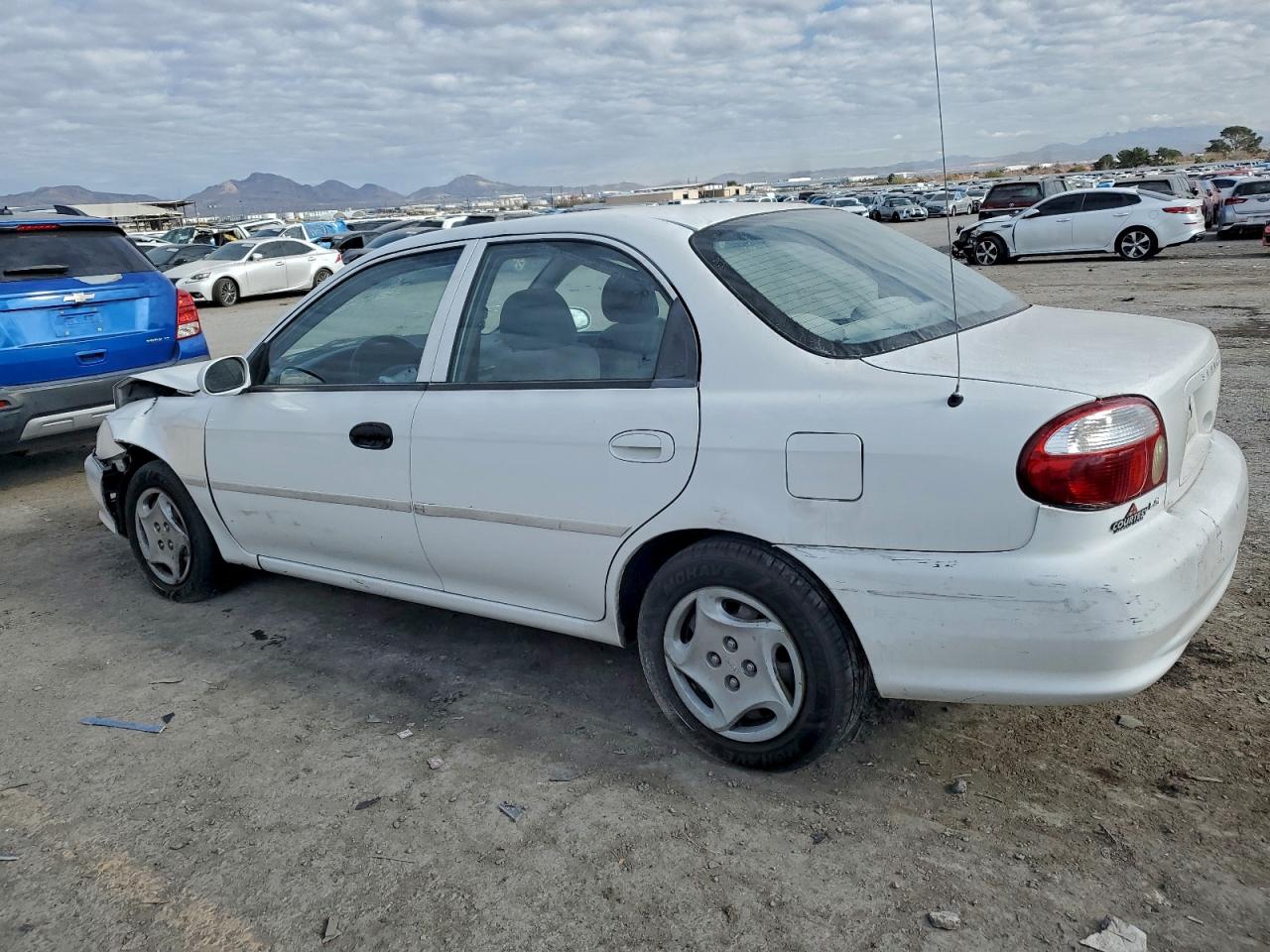 2001 Kia Sephia Base White vin: KNAFB121415011830