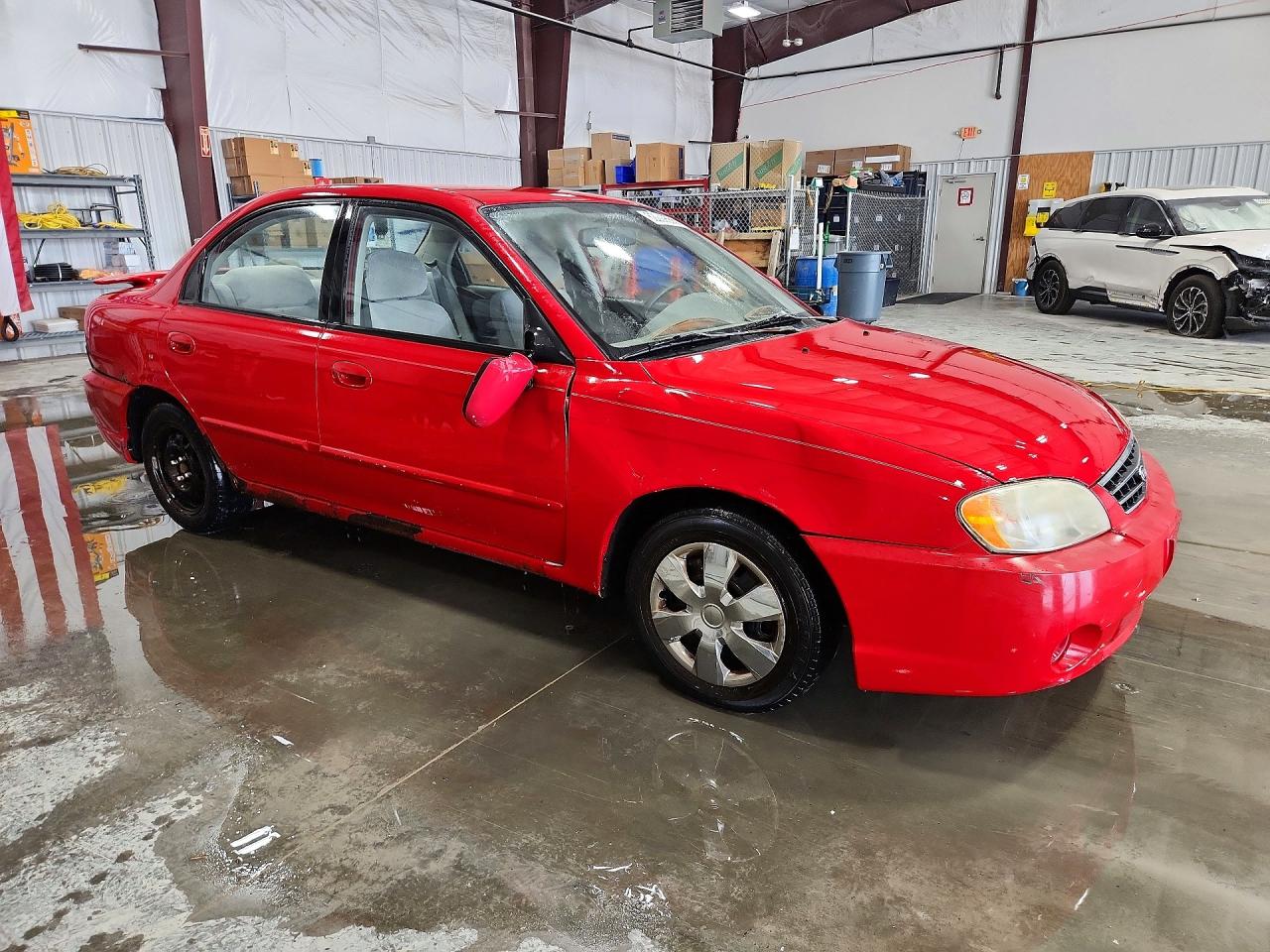 2004 Kia Spectra Base Red vin: KNAFB121545309971