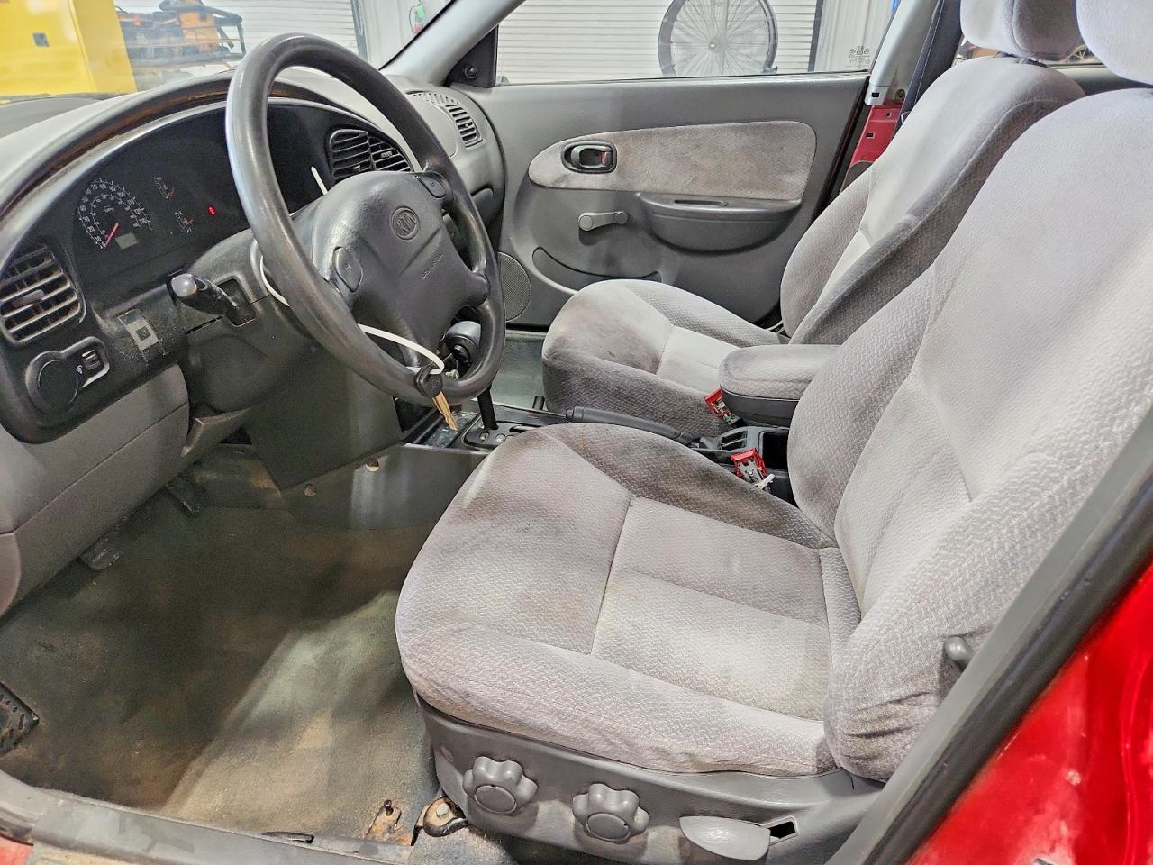 2004 Kia Spectra Base Red vin: KNAFB121545309971