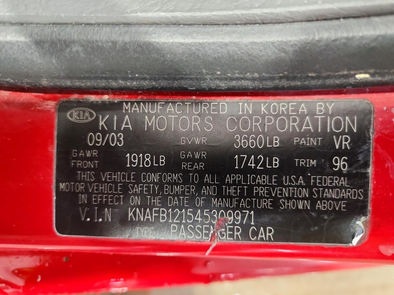 2004 Kia Spectra Base Red vin: KNAFB121545309971
