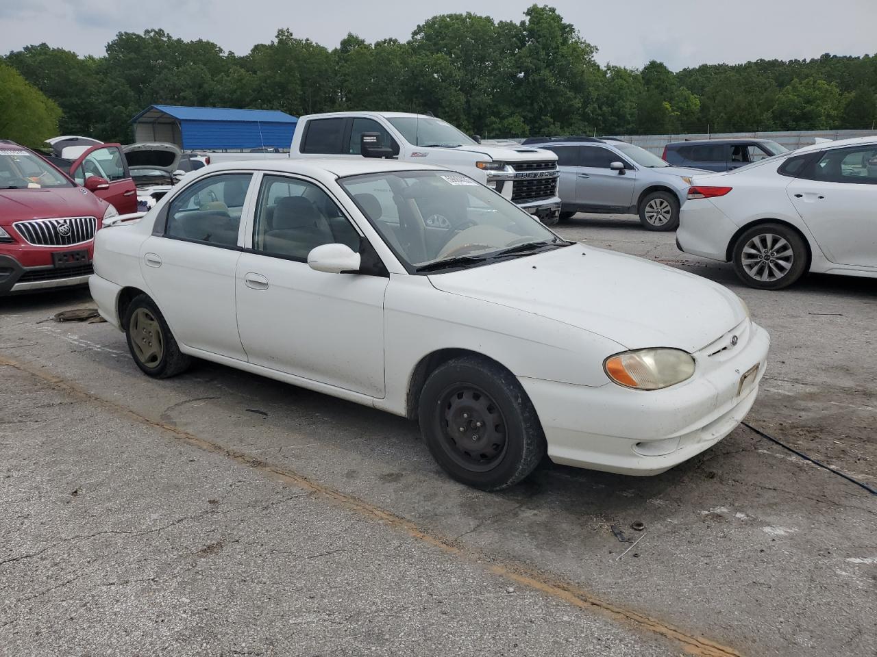 2001 Kia Sephia Base   White vin: KNAFB121615073133