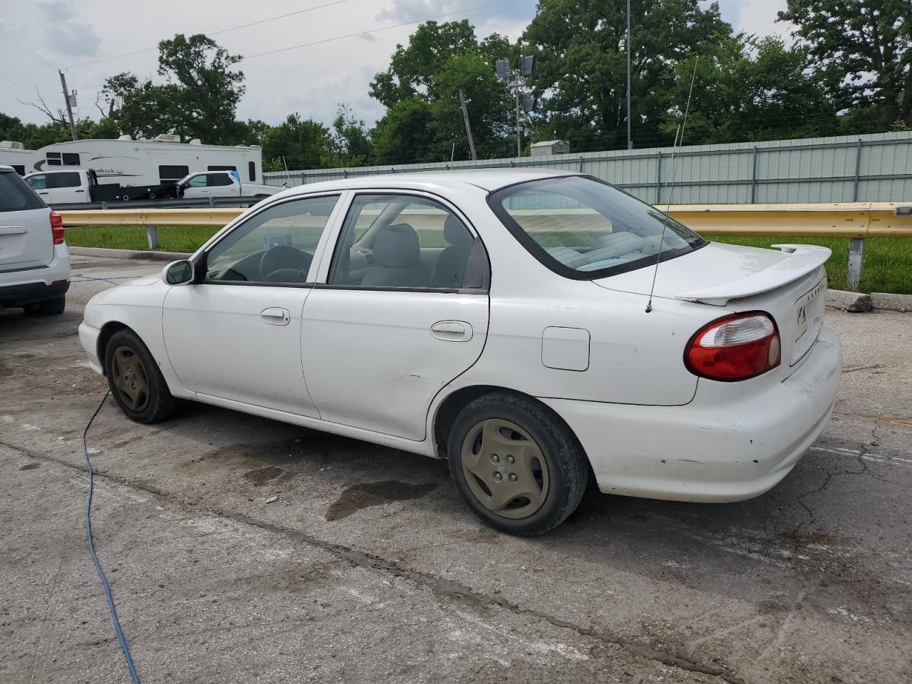 2001 Kia Sephia Base   White vin: KNAFB121615073133