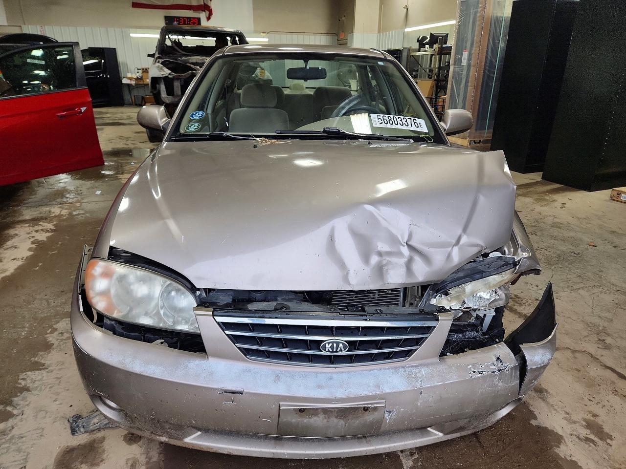 2003 Kia Spectra Base Желто-коричневый vin: KNAFB121835245231