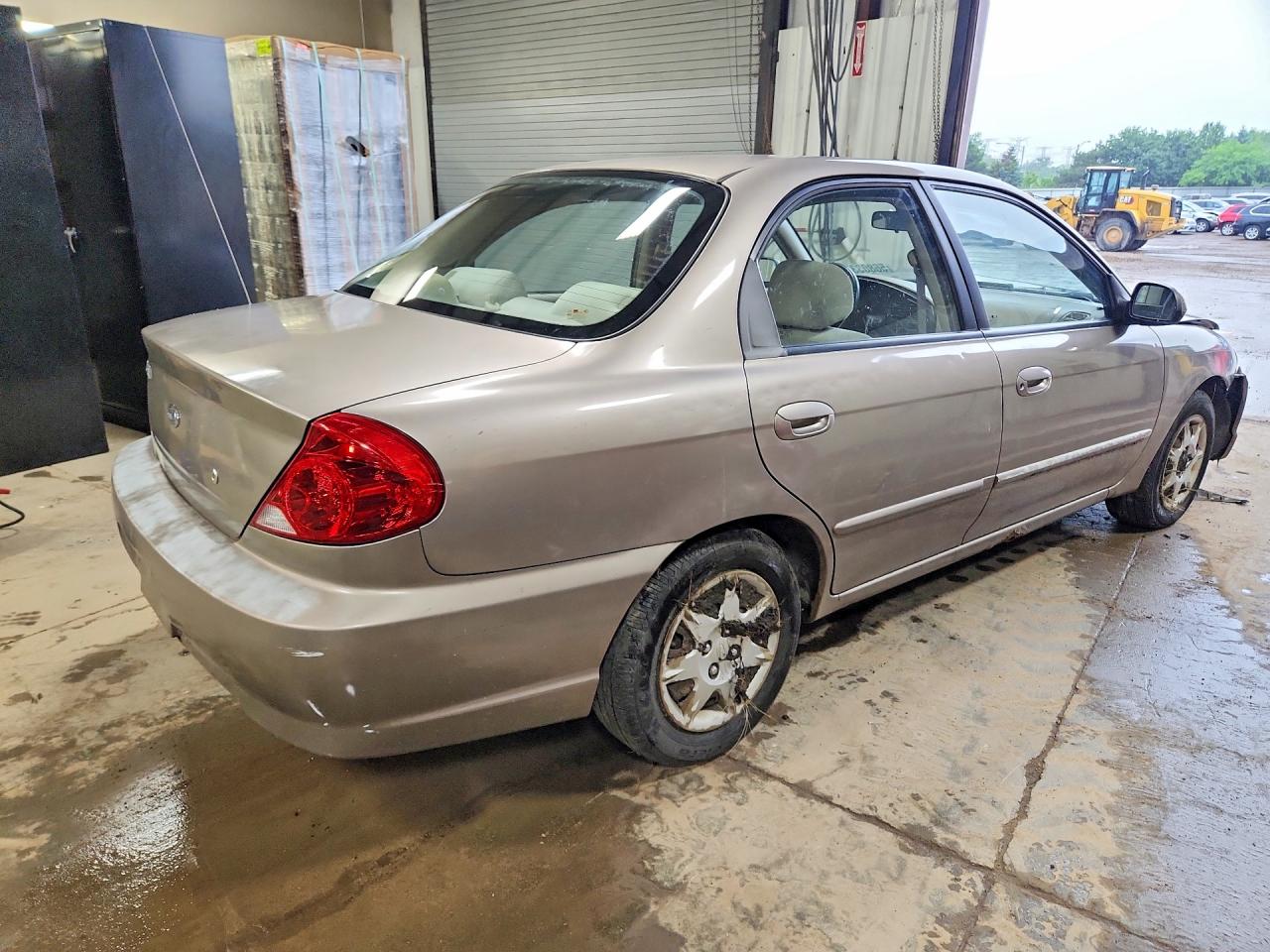 2003 Kia Spectra Base Желто-коричневый vin: KNAFB121835245231