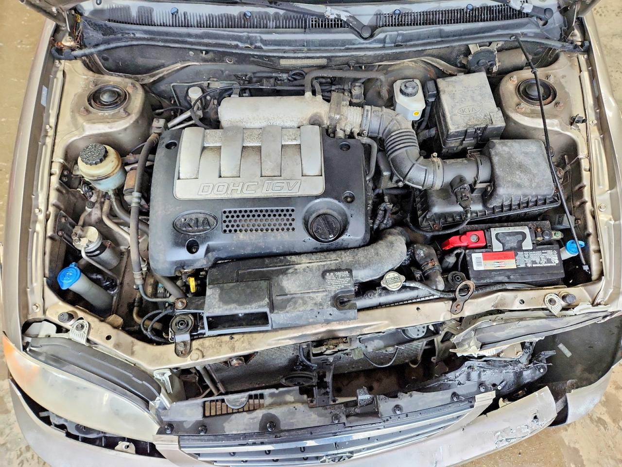 2003 Kia Spectra Base Желто-коричневый vin: KNAFB121835245231