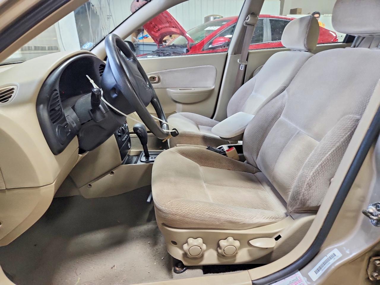2003 Kia Spectra Base Желто-коричневый vin: KNAFB121835245231