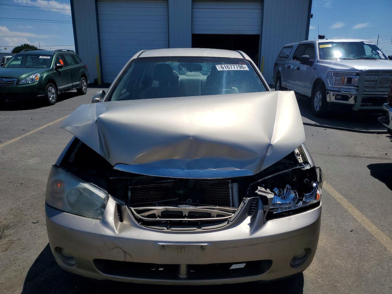 2006 Kia Spectra Ex Tan vin: KNAFE121165364539