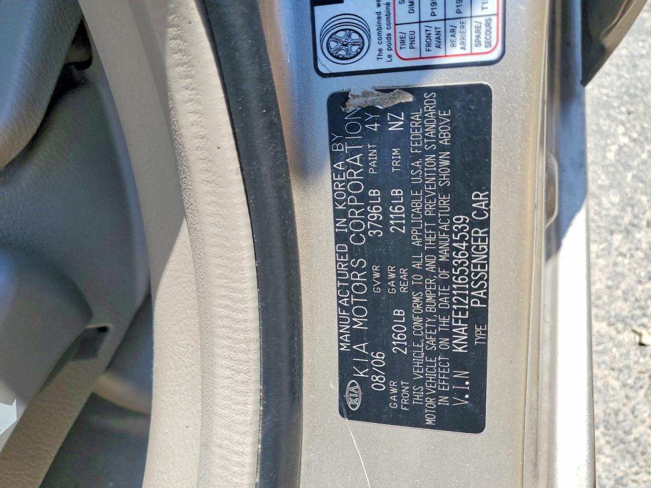 2006 Kia Spectra Ex Tan vin: KNAFE121165364539