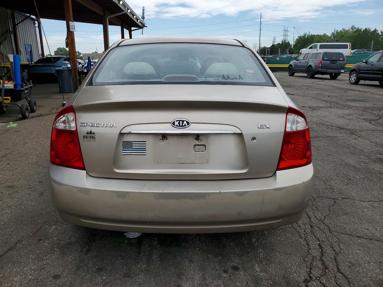 2004 Kia Spectra Lx Tan vin: KNAFE121345060335