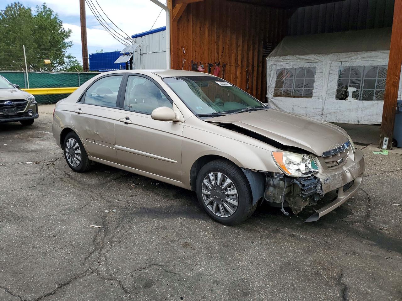 2004 Kia Spectra Lx Tan vin: KNAFE121345060335