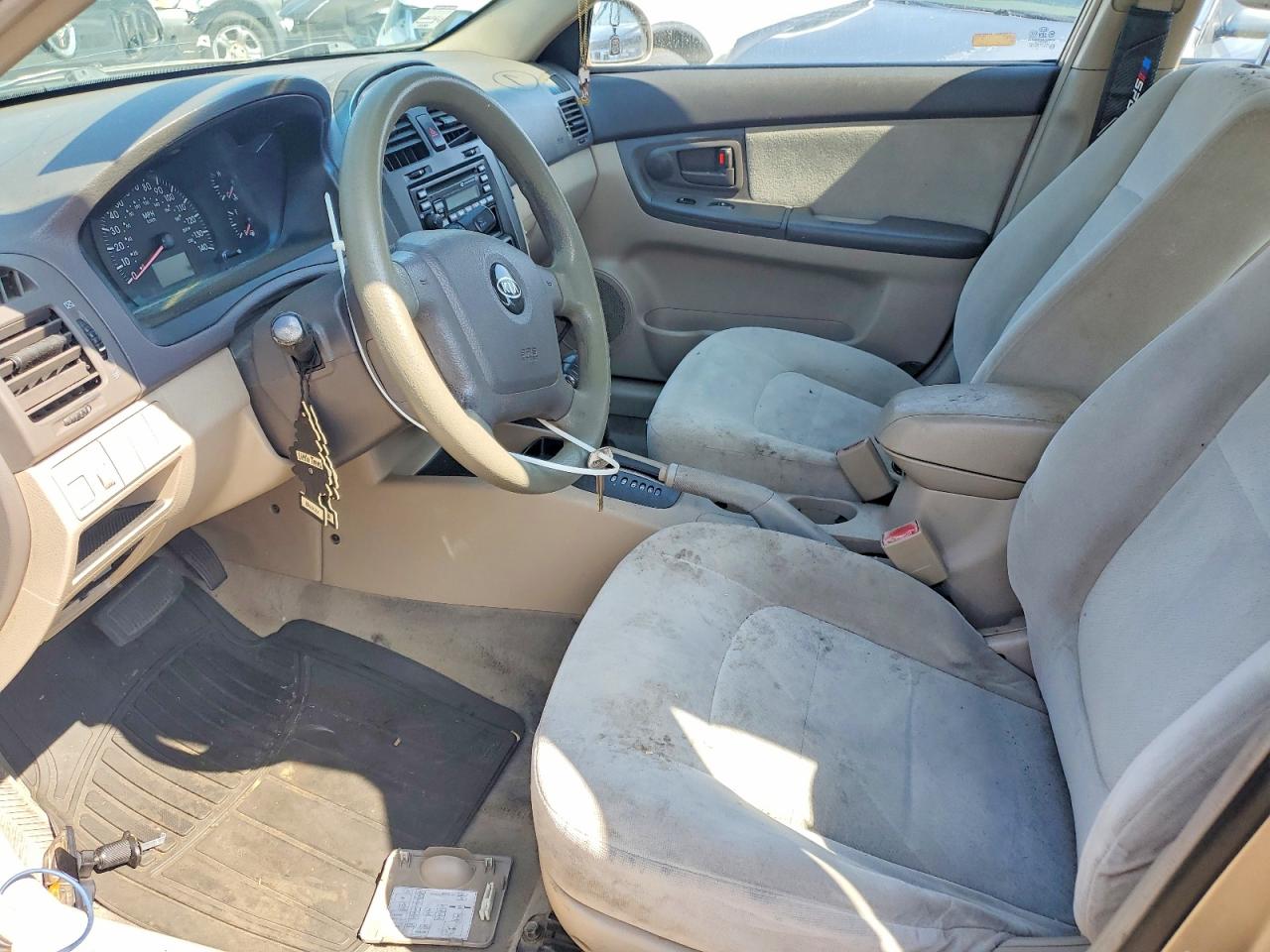 2004 Kia Spectra Lx Tan vin: KNAFE121345060335