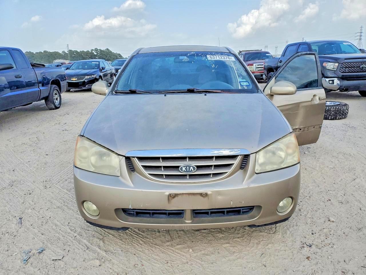 2005 Kia Spectra Lx Tan vin: KNAFE121855162053