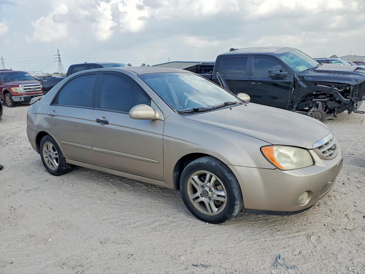 2005 Kia Spectra Lx Tan vin: KNAFE121855162053