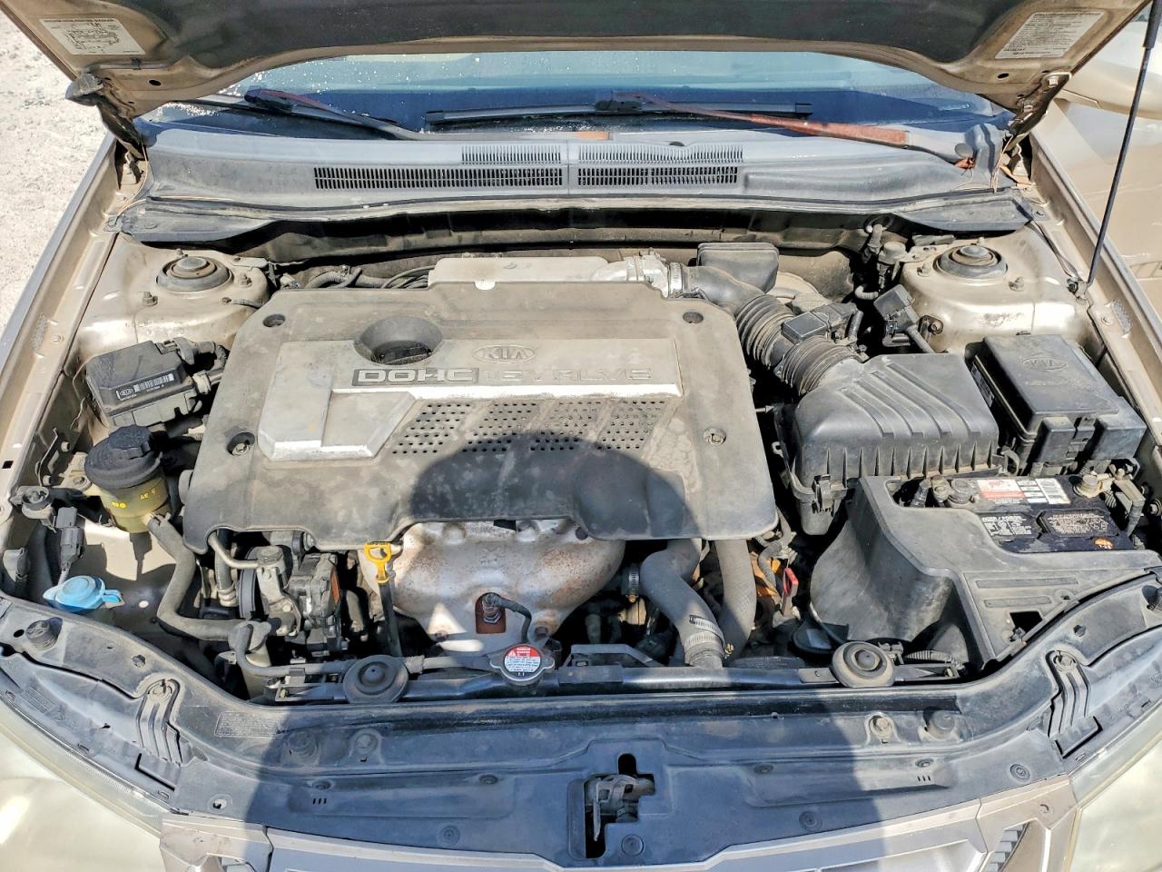 2005 Kia Spectra Lx Tan vin: KNAFE121855162053