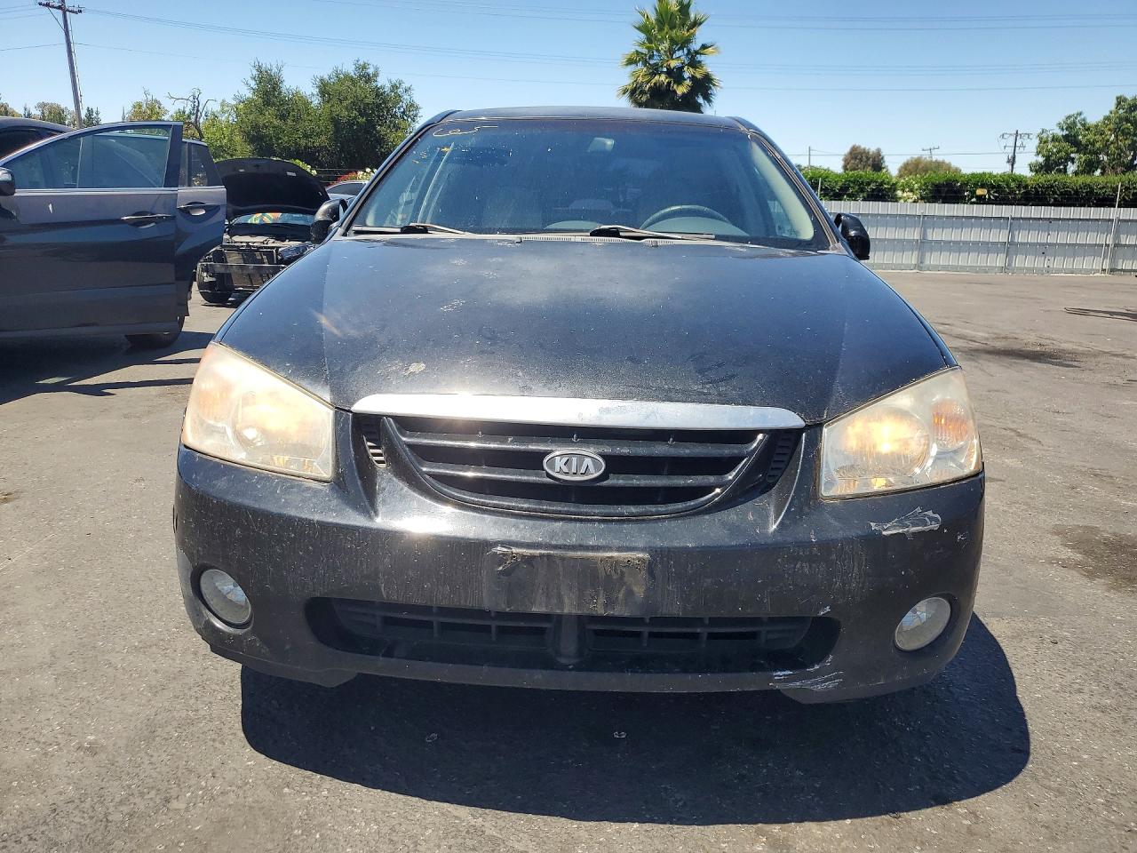 2005 Kia Spectra 4d Black vin: KNAFE122055102566