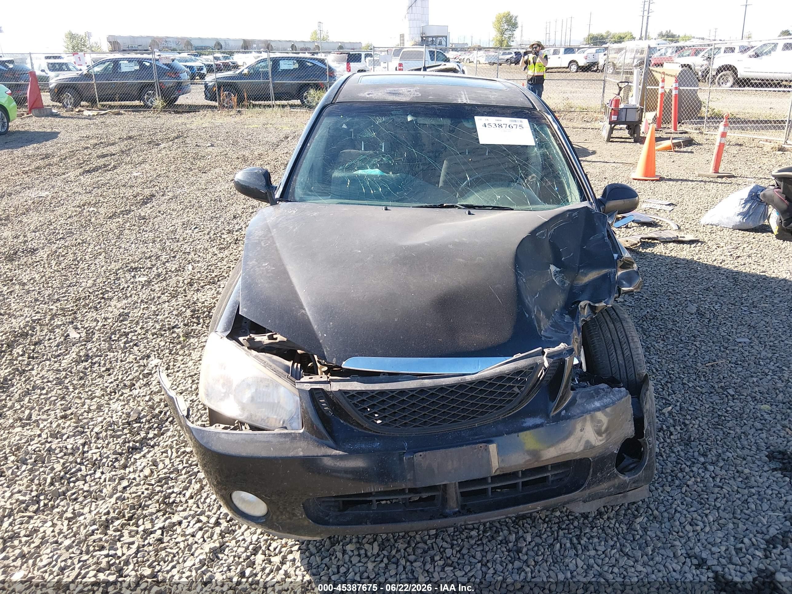 2005 Kia Spectra5   Black vin: KNAFE161355121369