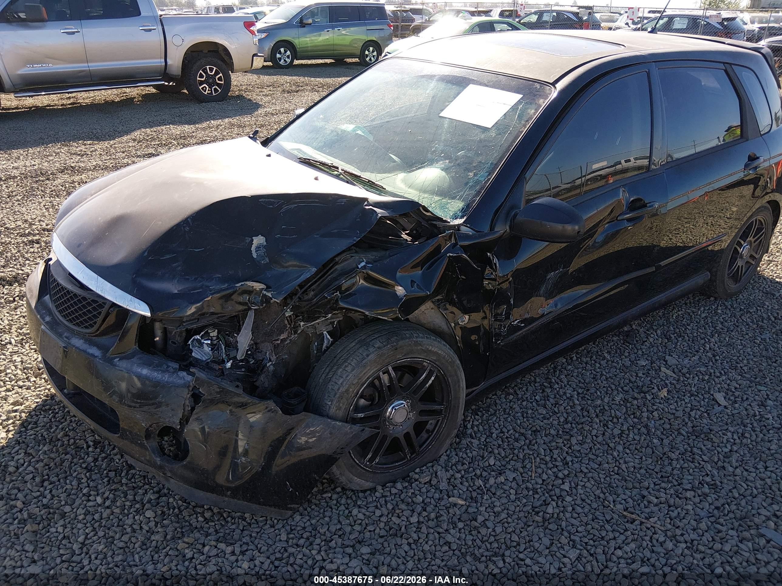 2005 Kia Spectra5   Black vin: KNAFE161355121369